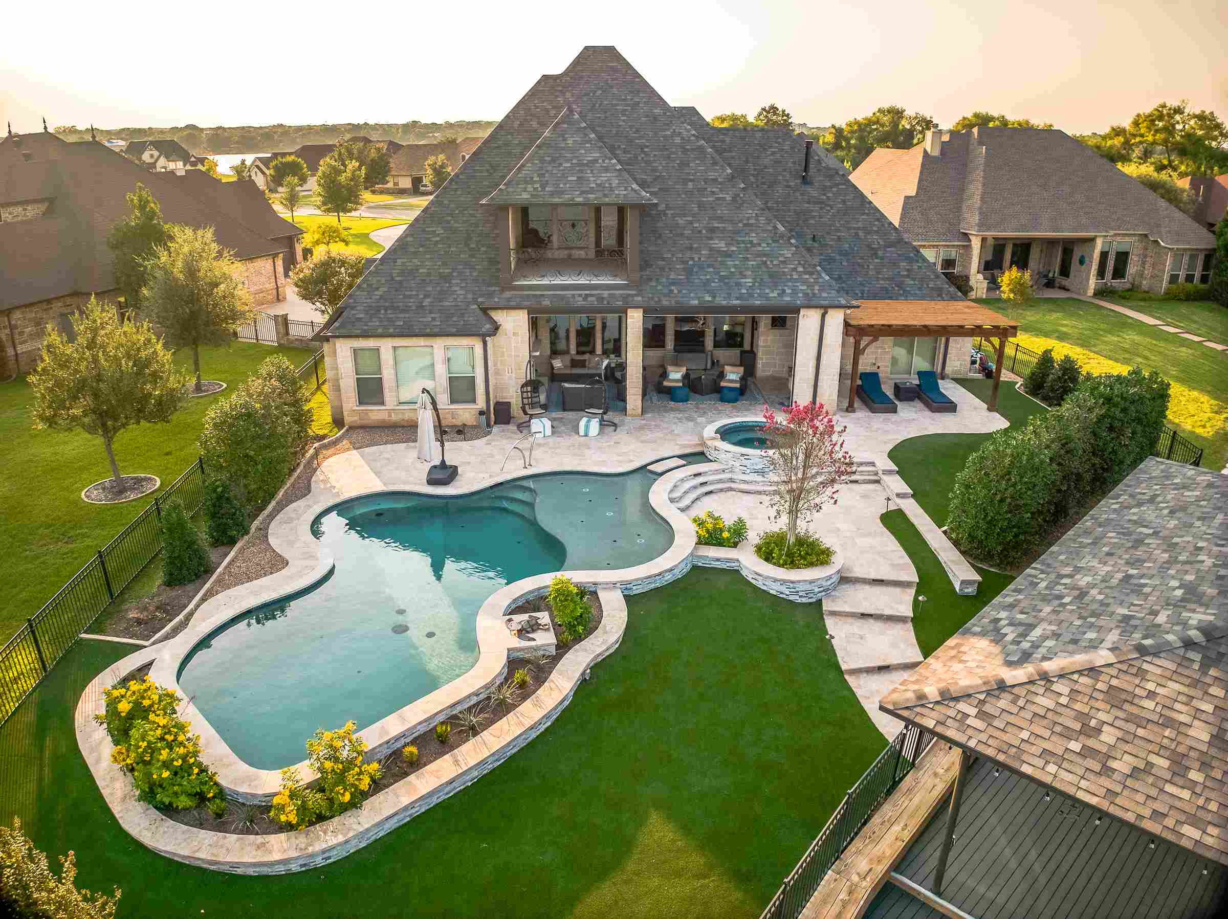 texas backyard with pool and green grass